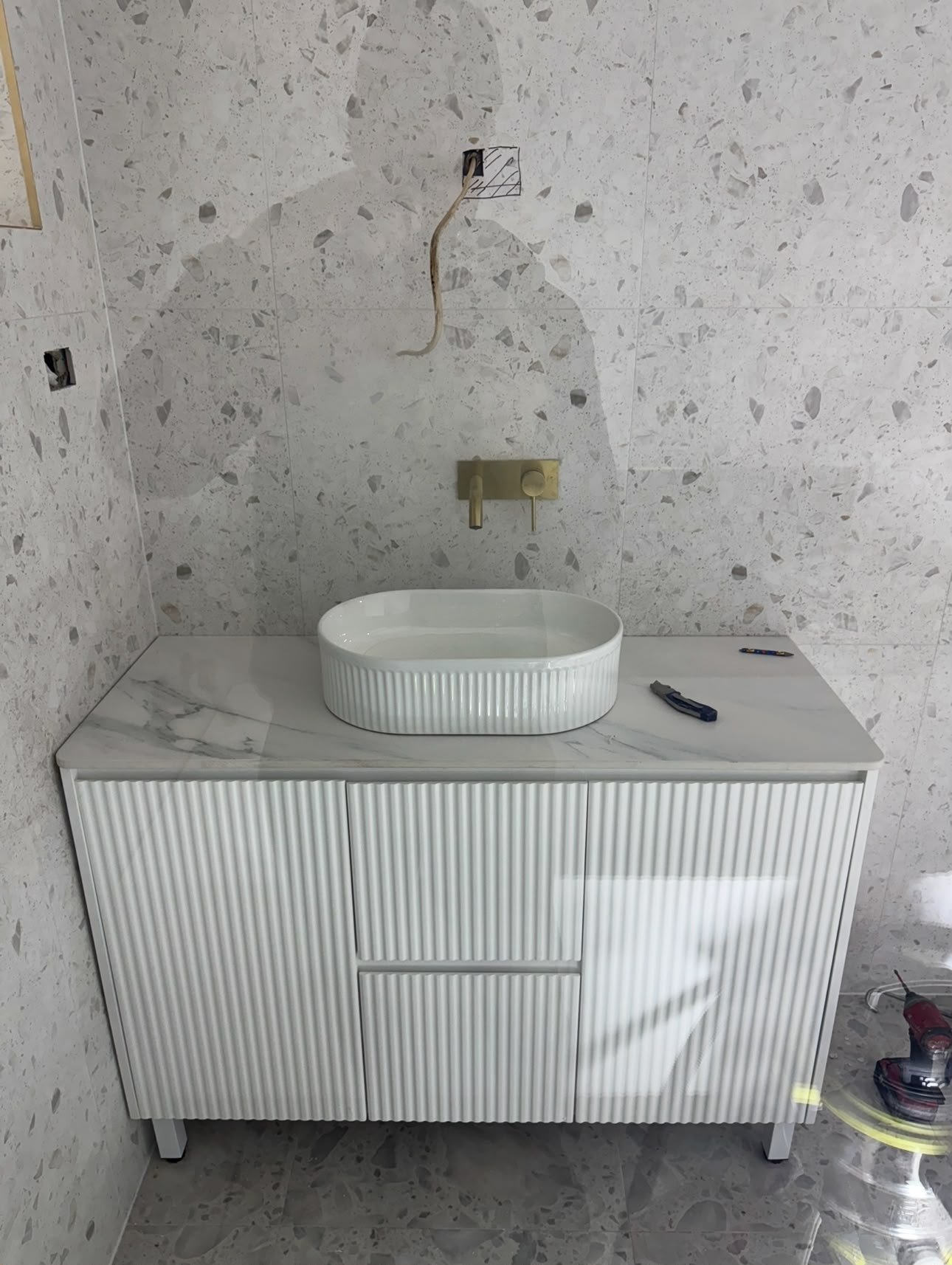 Compact bathroom shower and toilet renovation with frameless glass screen in Sydney